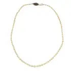 Cultured pearl necklace, 9ct gold garnet clasp
