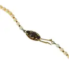 Cultured pearl necklace, 9ct gold garnet clasp