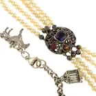 Imitation pearl necklace & charm bracelet 