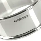 Set of four contemporary silver napkin rings 