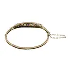 Late Victorian 9ct gold ruby & diamond bangle