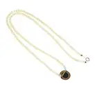 Opal composite pendant, on a cultured pearl necklace