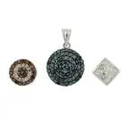 Three diamond & 'coloured' diamond pendants