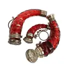 Three ruby glass horn or cornucopia scent bottles