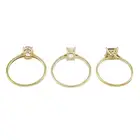 Three 9ct gold gem single-stone rings