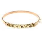 Edwardian 9ct gold ruby & diamond bangle