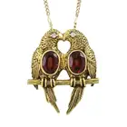 14ct garnet & diamond parrot pendant, with chain