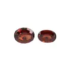 Two oval-shape orangy-red garnets, 4.03ct