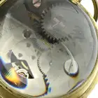 Open face 'Ball' pocket watch with similar example