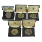 Royal Mint, four bronze art medals; plus a Westminster Abbey medal (5)