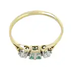 Synthetic emerald & diamond three-stone ring