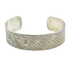 Silver bangle, by Gerald Benney