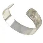 Silver bangle, by Gerald Benney