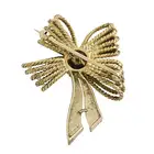 Diamond & ruby bow brooch
