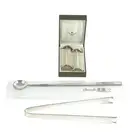 Christofle knife rests, tongs & cocktail spoon (3)