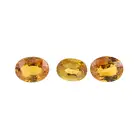 Three oval-shape orange sapphires, 5.28ct