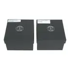 Pair of small contemporary silver mounted coasters 