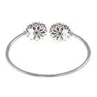 18ct gold ruby & diamond floral cuff bangle