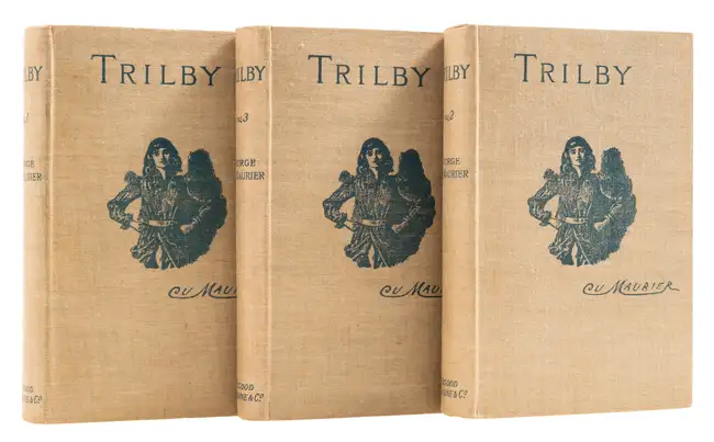 106 Du Maurier (George) Trilby, 3 vol., first edition, with A.L.s. from the author, Osgood, McIIvaine, 1894