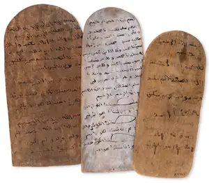 West Africa.- Three Quranic boards, for either ritual or pedagogical use, ink on carved wooden panels, text in Arabic, West Africa (perhaps Mali), [early twent