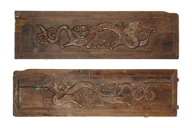 
	
		A pair of Chinese wood rectangular panels, 19th century, each decorated in relief with...