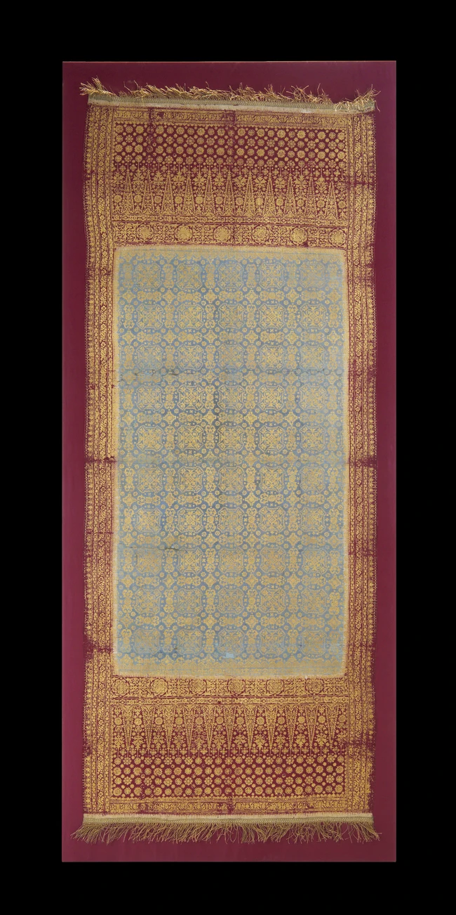A gold printed textile panel, Sumatra, Indonesia, 19th century, 
The central field with...