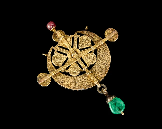 A diamond- and emerald-set Naya Chand Nyam pendant,India, circa 1900-1920
Made of five...