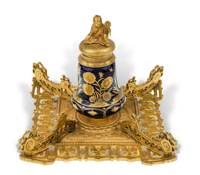 
	
		A Victorian gilt-bronze and porcelain inkwell, late 19th century, in the chinoiserie...