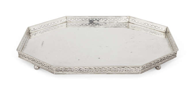 
	
		An elongated octagonal silver tray, Birmingham, c.1924, Albert Edward Jones, raised on...