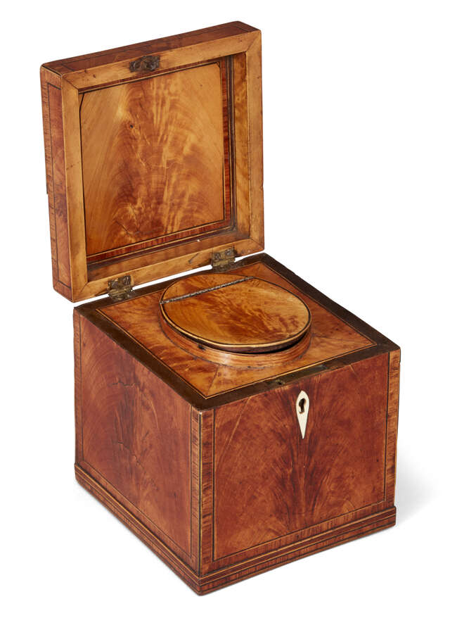 
	
		A George III satinwood cube-shape tea caddy, oval inlaid canister to interior, ivory...