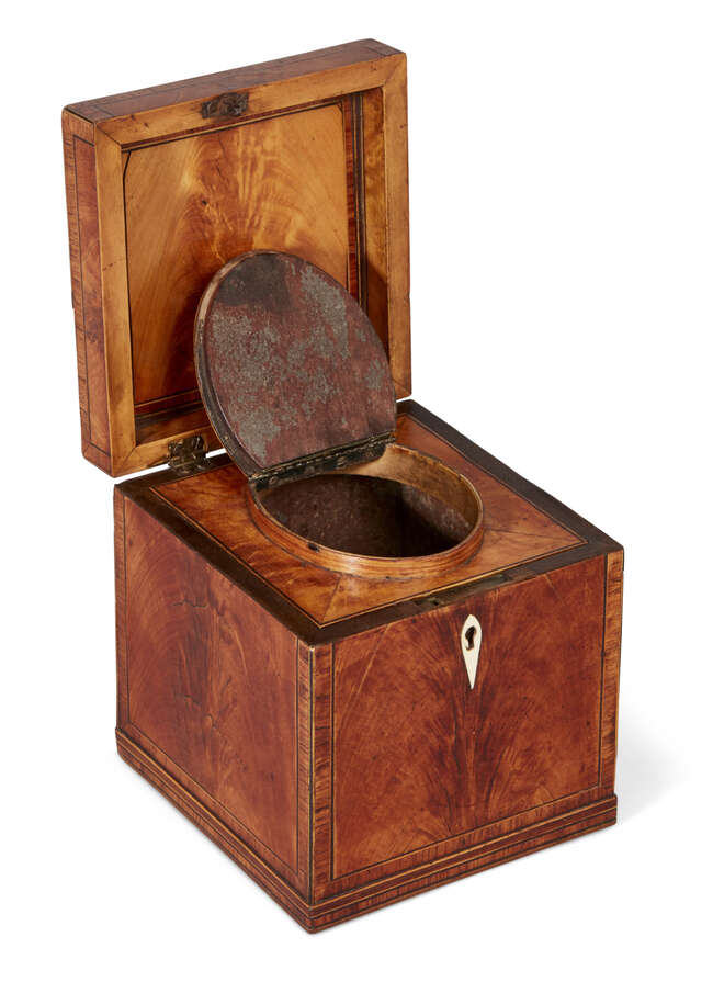 
	
		A George III satinwood cube-shape tea caddy, oval inlaid canister to interior, ivory...