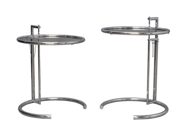 
	
		Eileen Gray (British 1878-1976), a pair of model &#39;E1027&#39; glass and chrome side tables for...