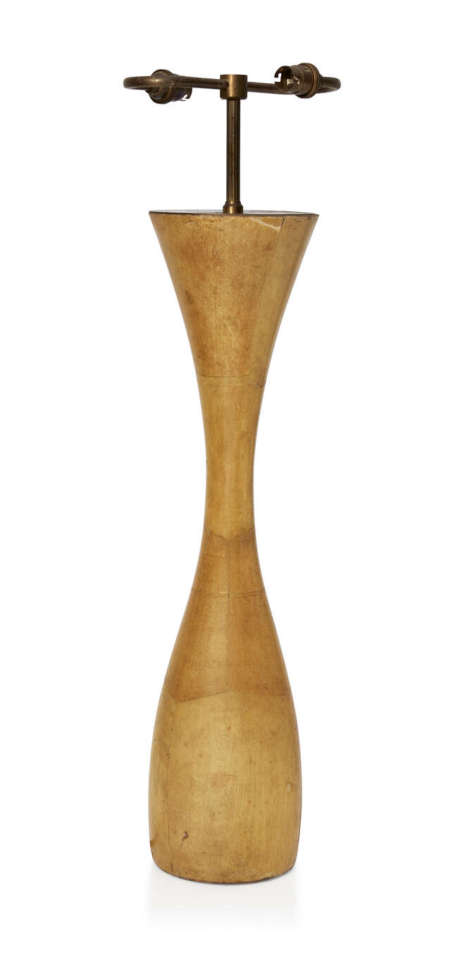 
	
		Italian, a lacquered parchment and brass table lamp in the manner of Aldo Tura  
		