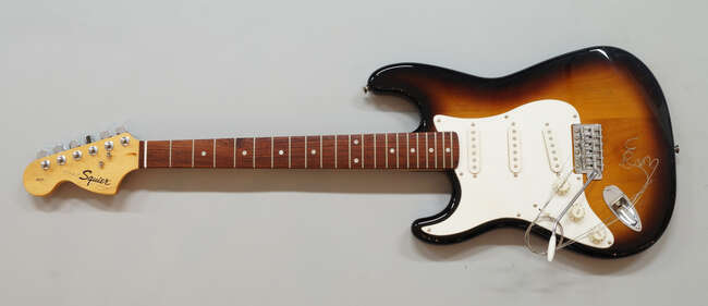 
	
		A left-handed Squire Strat by Fender guitar, with 22 frets, volume and tone knobs,...