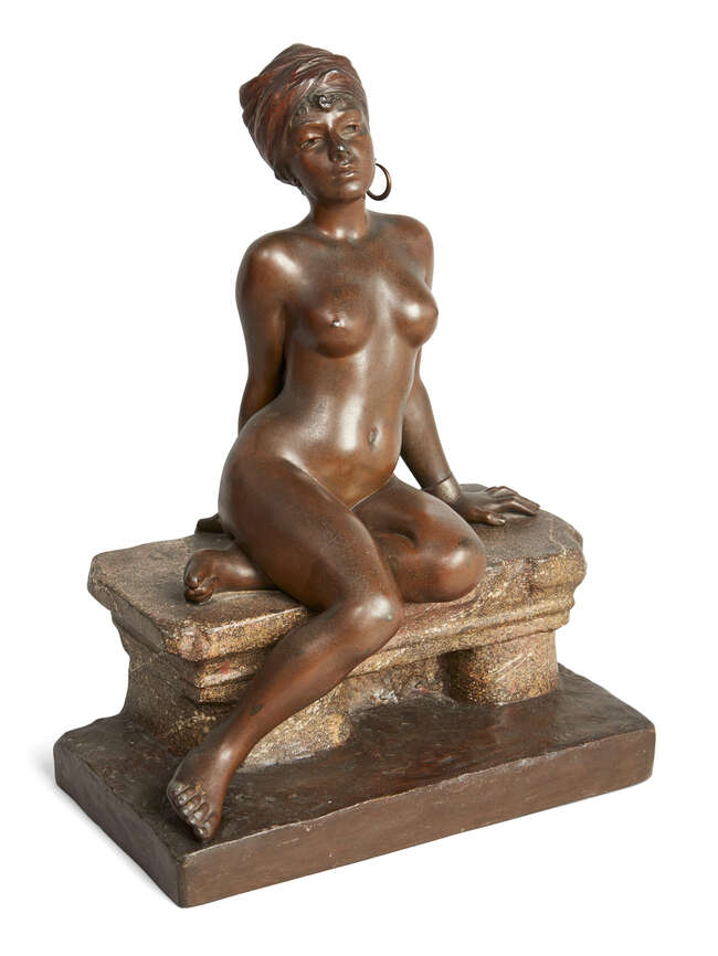 
	
		After Emmanuel Villanis, French, 1858-1914, a spelter figure of a Nubian nude slave,...