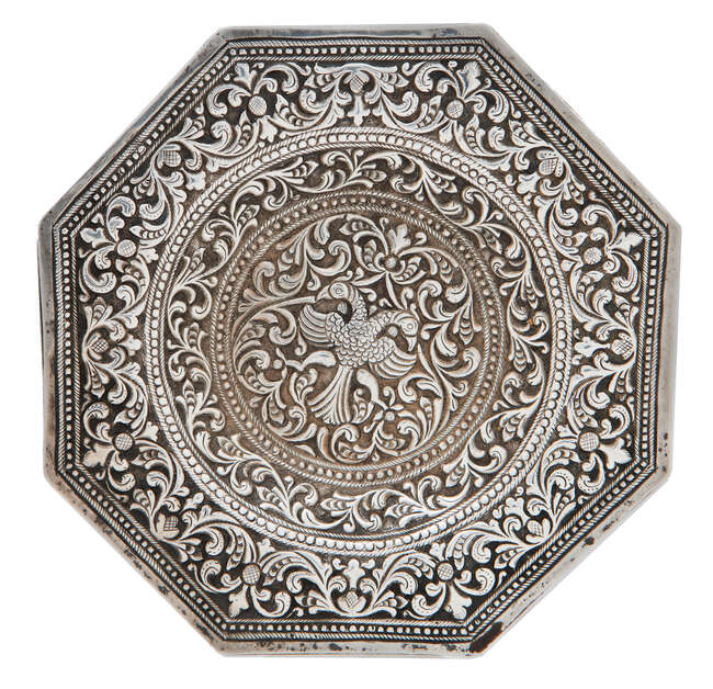 A small repousse work silver dish, Kandy, Sri Lanka, late 19th century, of octagonal form, with...