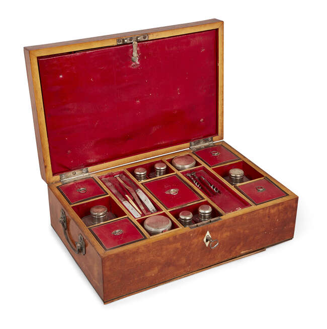 
	
		A George III satinwood fitted toilet box, with ebony stringing, the extensively fitted...