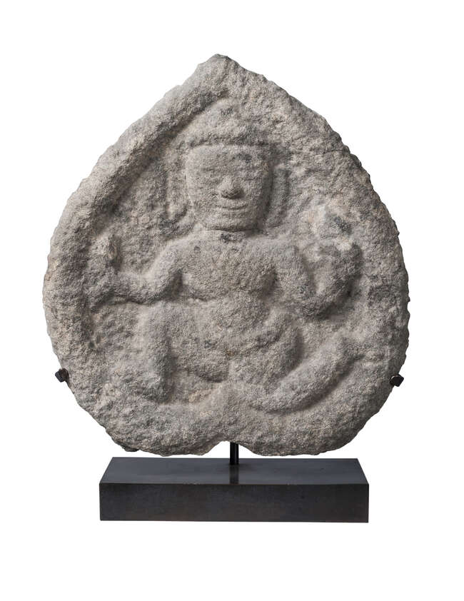 
	
		A South East Asian stone stele, 10th century, carved with a male deity, 26cm x 23cm

	

