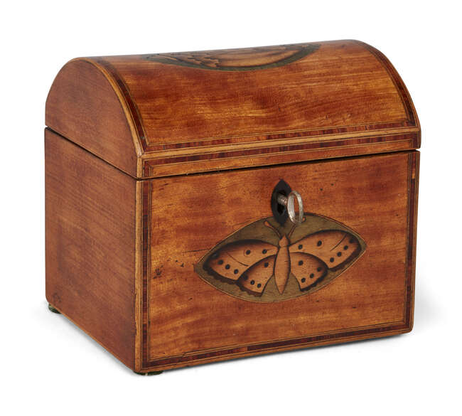 
	
		A Regency inlaid satinwood dome-top tea caddy, inlaid with butterfly and shell motifs,...