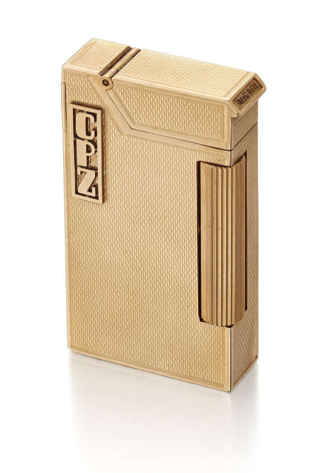 
	
		Dunhill, A 9ct gold cased &#39;Rollagas&#39; Cigarette Lighter, by Dunhill,
		the engine-turned...