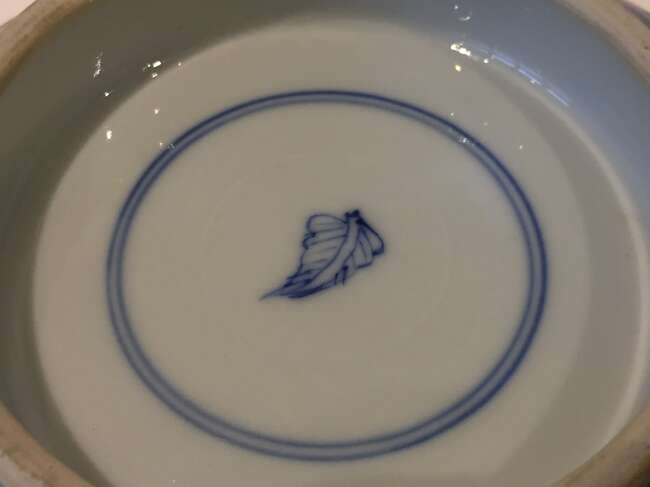 
	
		A Chinese porcelain boy and chicken bowl, 19th century, painted in famille verte enamels...