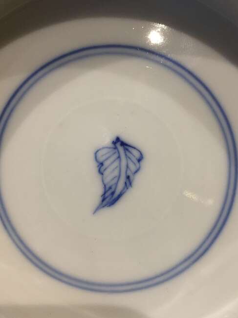 
	
		A Chinese porcelain boy and chicken bowl, 19th century, painted in famille verte enamels...