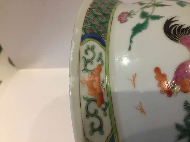 
	
		A Chinese porcelain boy and chicken bowl, 19th century, painted in famille verte enamels...