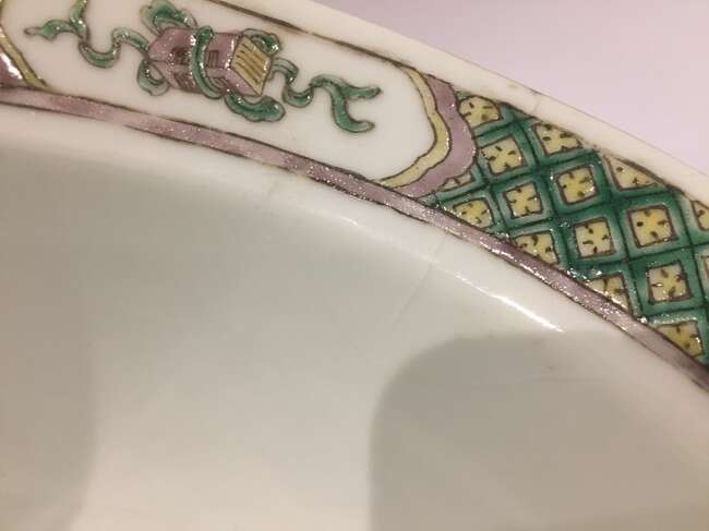 
	
		A Chinese porcelain boy and chicken bowl, 19th century, painted in famille verte enamels...