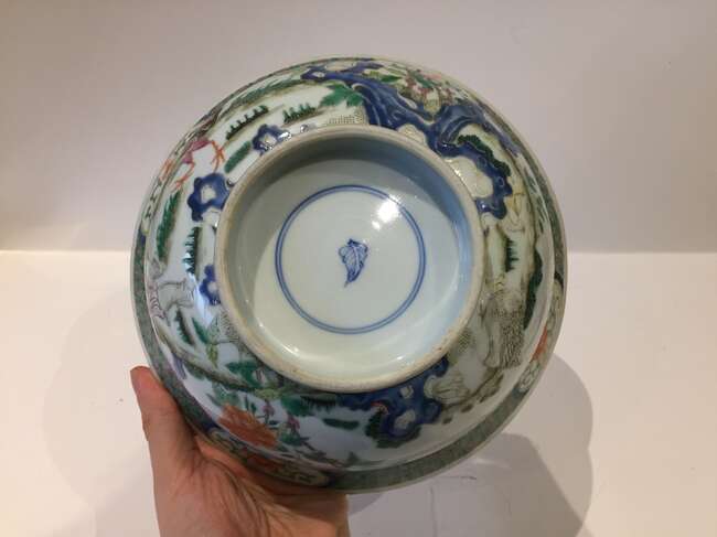 
	
		A Chinese porcelain boy and chicken bowl, 19th century, painted in famille verte enamels...