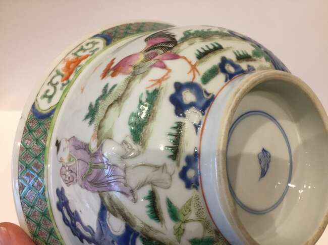 
	
		A Chinese porcelain boy and chicken bowl, 19th century, painted in famille verte enamels...