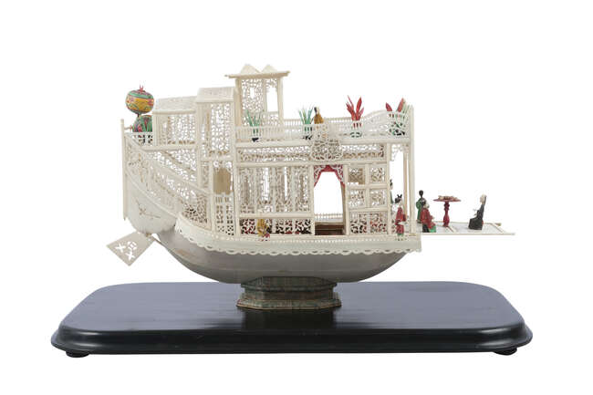 
	
		A Chinese Canton ivory model of a pleasure boat, 19th century, of two levels, intricately...