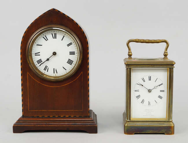 
	
		A French  brass carriage clock retained by J.W. Benson, with Roman numeral chapter ring...