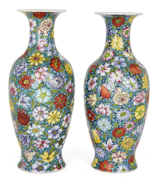 
	
		A pair of Chinese famille rose millefleur vases, Republic period, painted to the body...