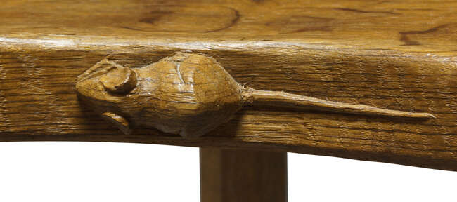
	
		Robert Thompson (1876-1955), a Mouseman English oak three-legged stool
		c.1970, signed...